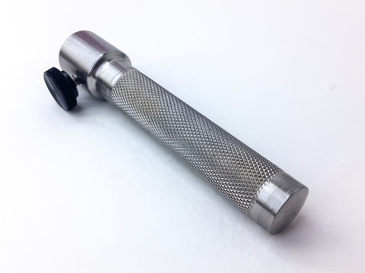 Leather stamp handle, reverse view showing the knurled grip and thumb screw